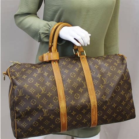 cheap mens louis vuitton duffle bag|louis vuitton monogram duffle bag.